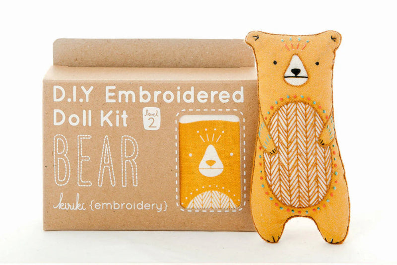 D.I.Y. Embroidered Doll Kit with a bear design on a cardboard box.